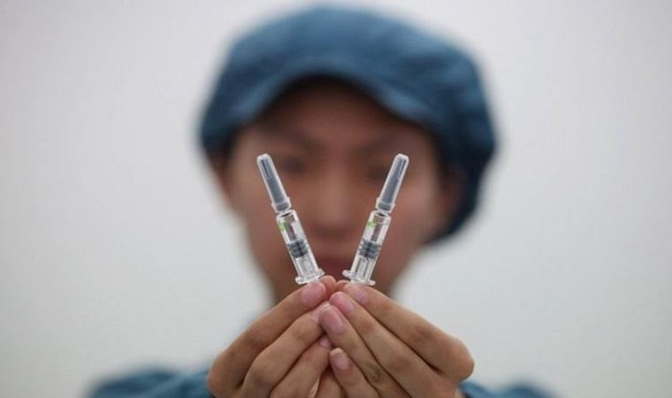 Covid aşısı: Çin'de tuzlu su ve maden suyu doldurulmuş şişeler aşı diye satıldı, 70 kişi gözaltında