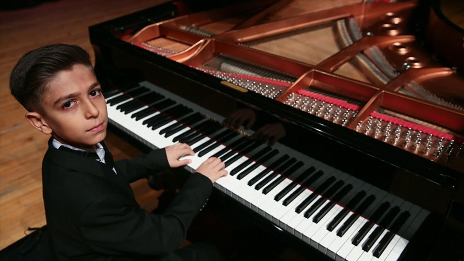 145516026 piyanonun 11 yasindaki turk yetenegi uluslararasi mozart yarismasinda birincilik kazandi